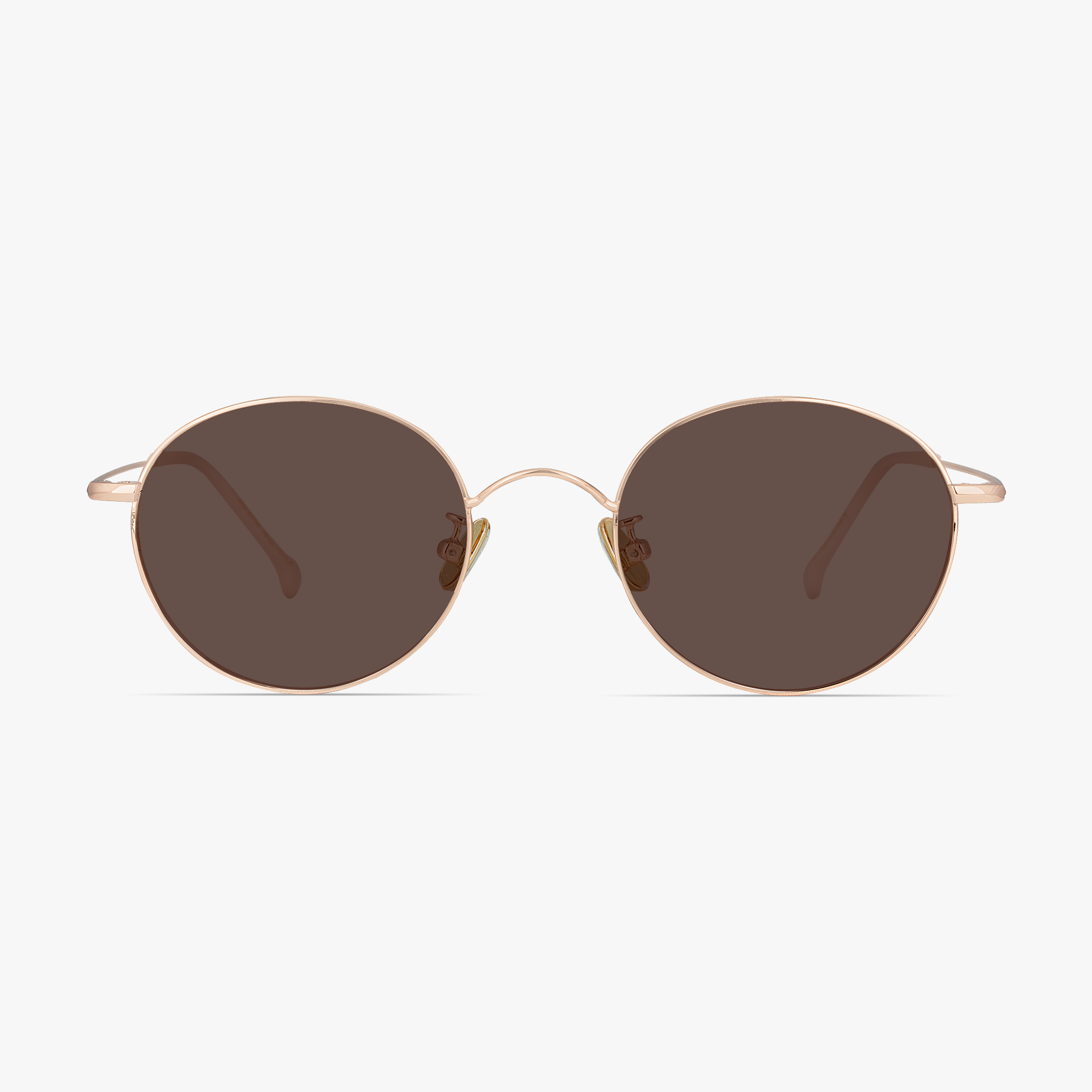 Simone Rose Gold Round Sunglasses for women from FramesFoundry – Front View