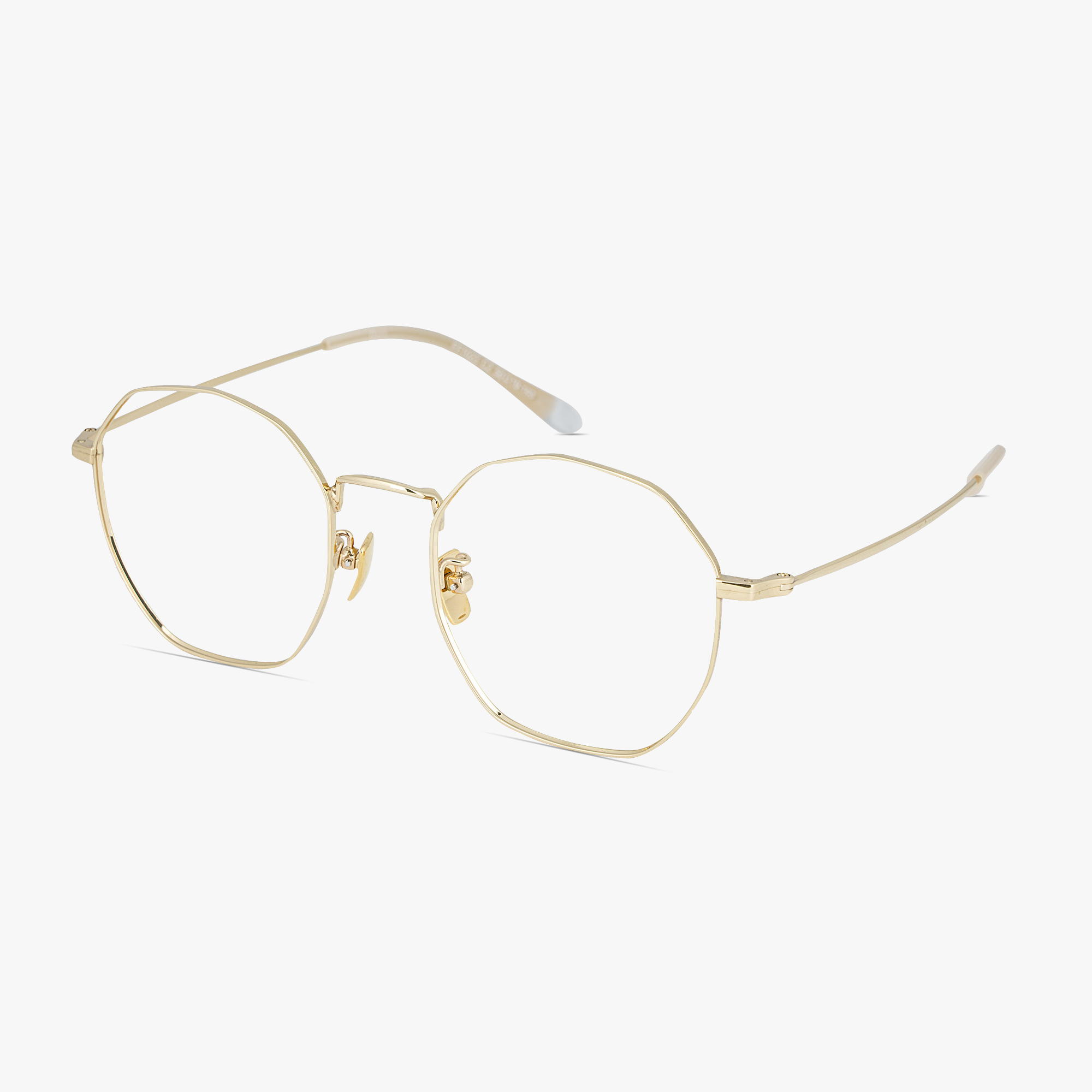 Ozzy Round Gold Titanium Glasses for Men and Women by Framesfoundry - Angle View