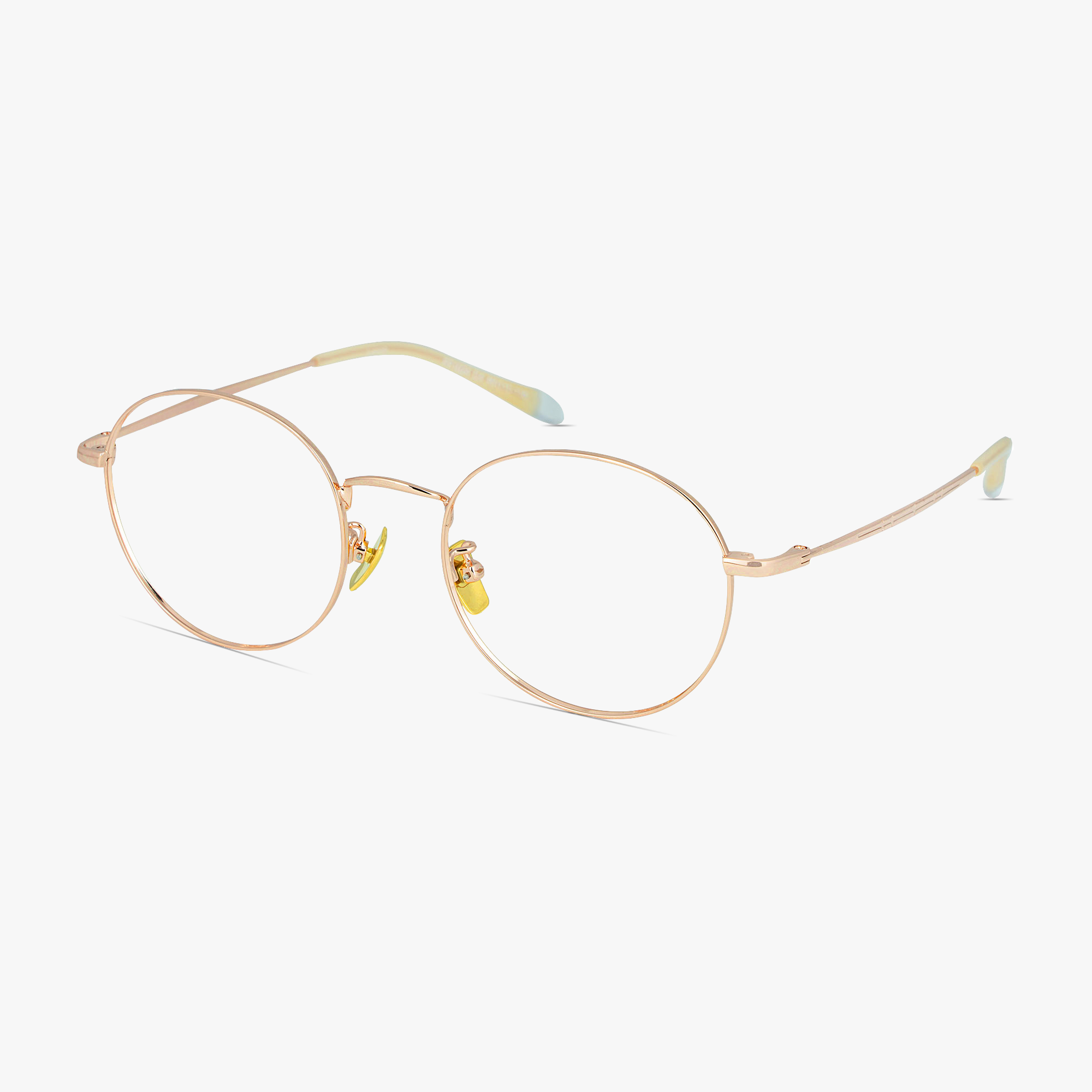 Lenon Rose Gold Round Titanium Glasses for Men and Women from Framesfoundry - Angle View
